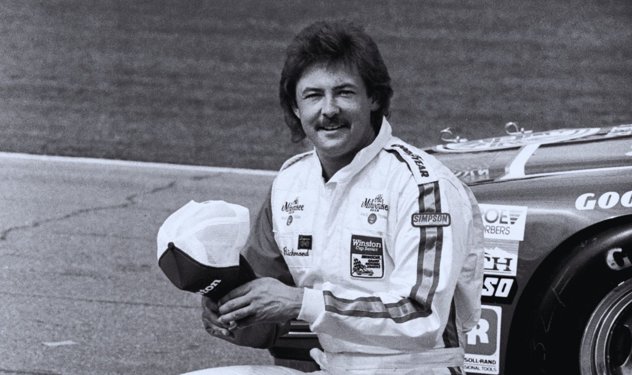 Gettyimages - 136253430, 1983 Firecracker 400 DAYTONA BEACH, FL - JULY 3, 1983: NASCAR driver Tim Richmond poses for photographers after qualifying for the 1983 Firecracker 400 on July 3, 1983 at the Daytona International Speedway in Daytona Beach, Florida. 