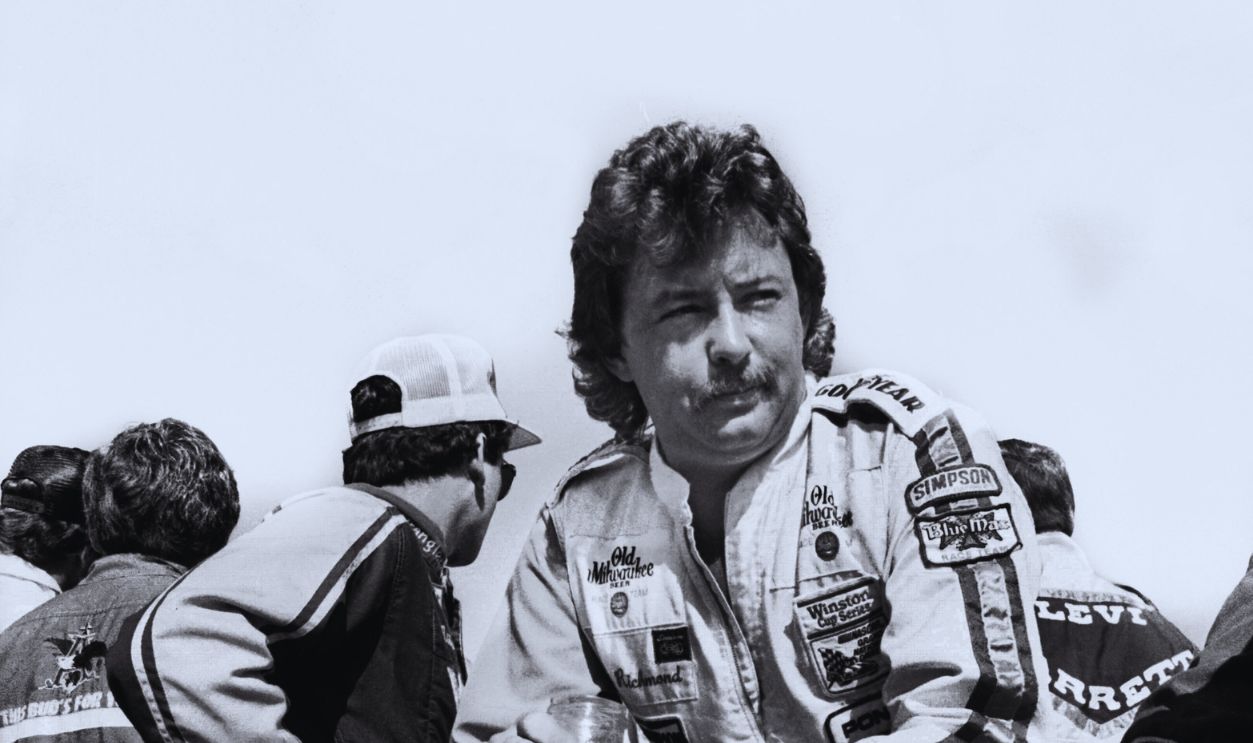 Gettyimages - 136253342, 1984 Firecracker 400 DAYTONA BEACH, FL - JULY 4, 1984: NASCAR driver Tim Richmond waits for his name to be called at drivers' introductions during opening ceremonies for the 1984 Firecracker 400 on July 4, 1984 at the Daytona International Speedway in Daytona Beach Florida. 