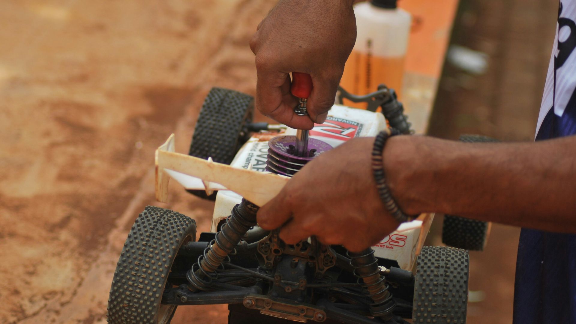 person holding black and gray metal tool