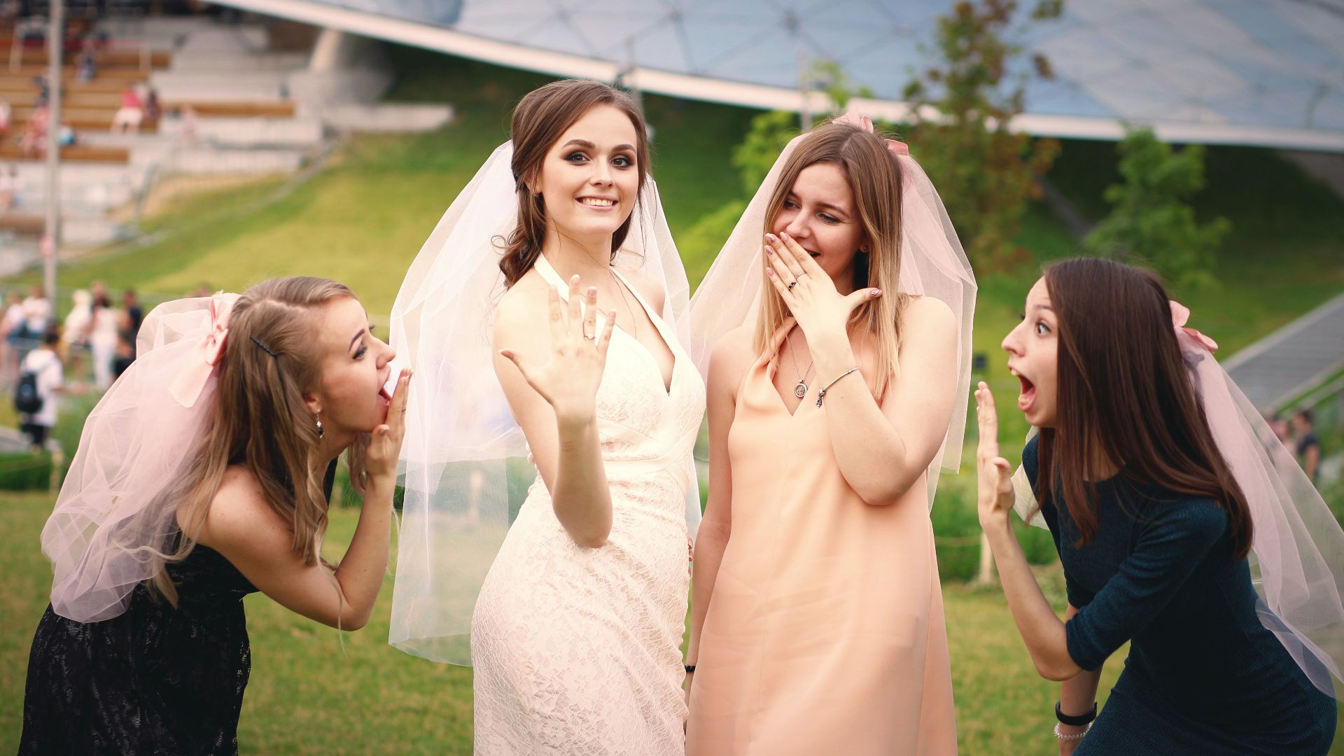a group of young women standing next to each other