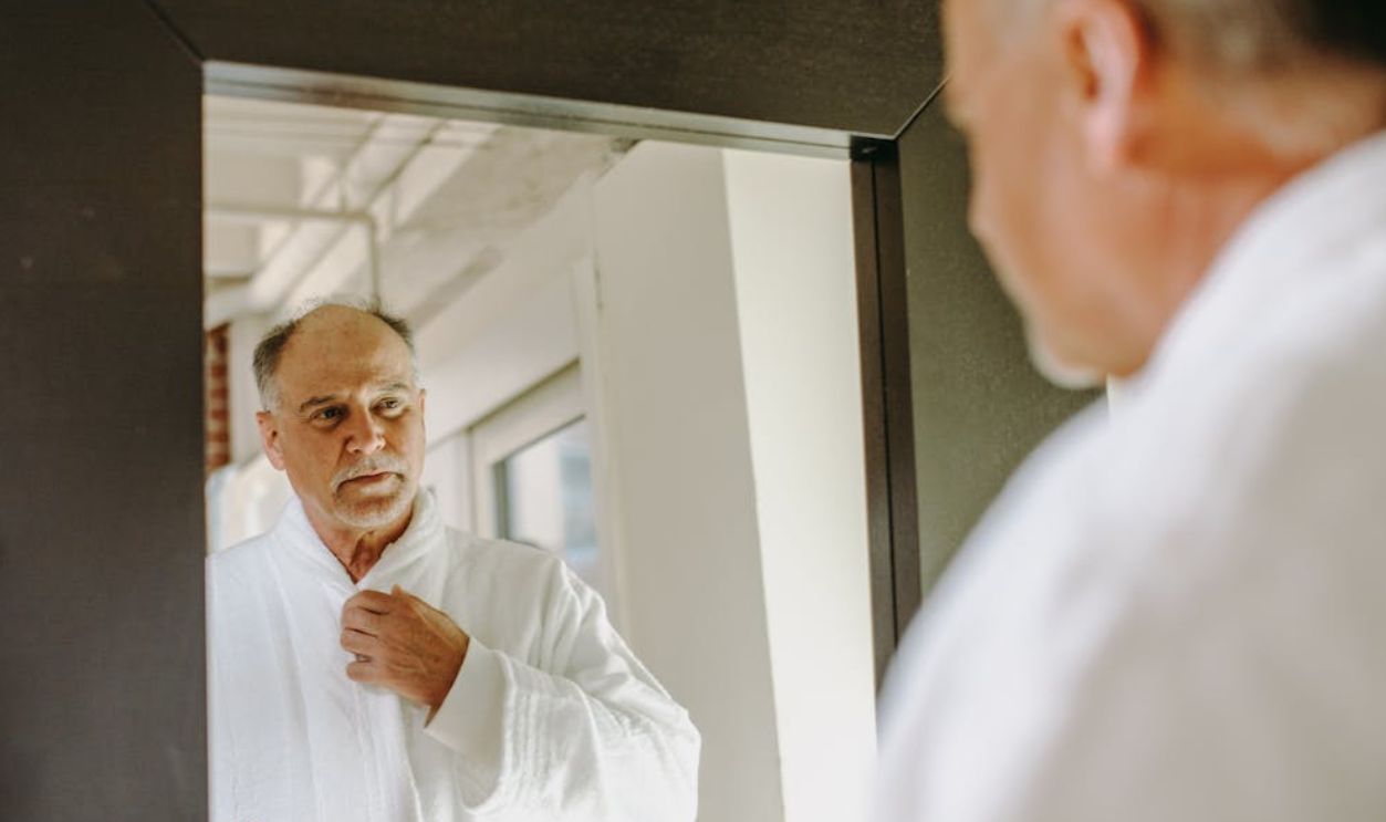 Elderly Man Looking in the Mirror