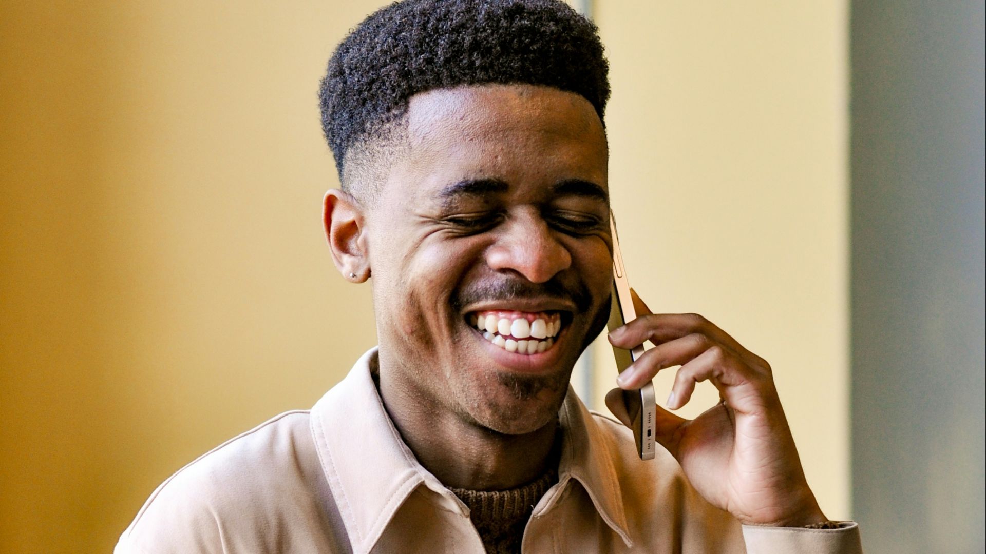 a man talking on a cell phone