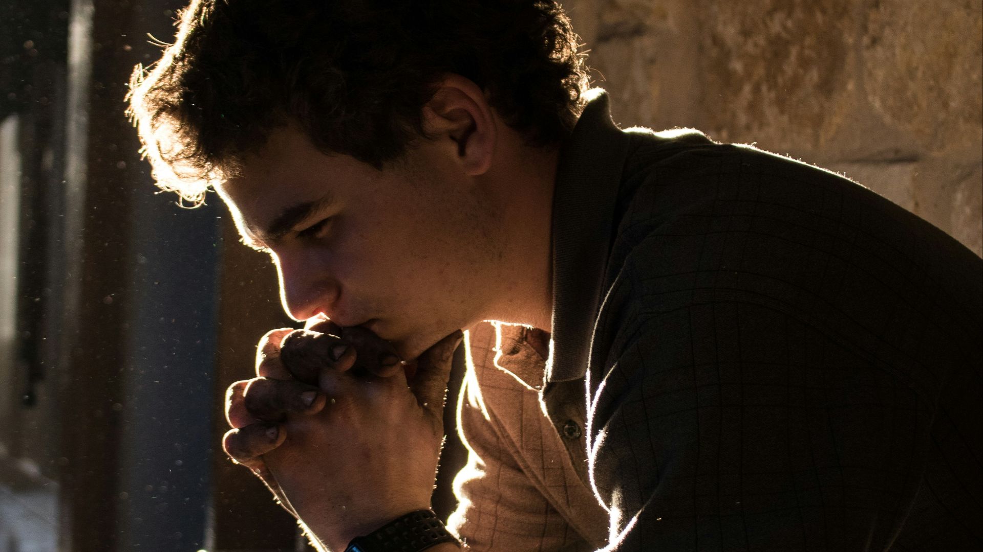 man sitting on bench