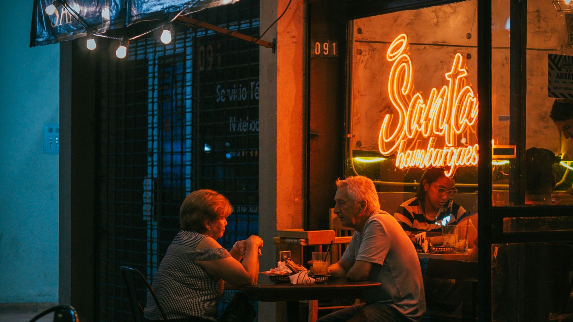 People dining at a restaurant at night