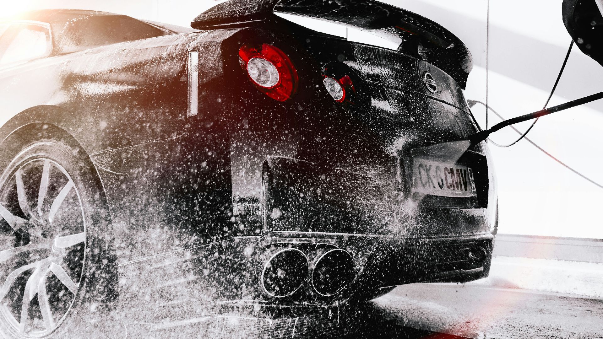 grayscale photo of black car