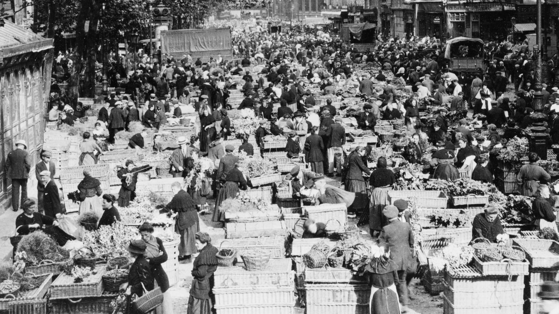 File:Nearly identical views of street market in Paris, France.jpg
