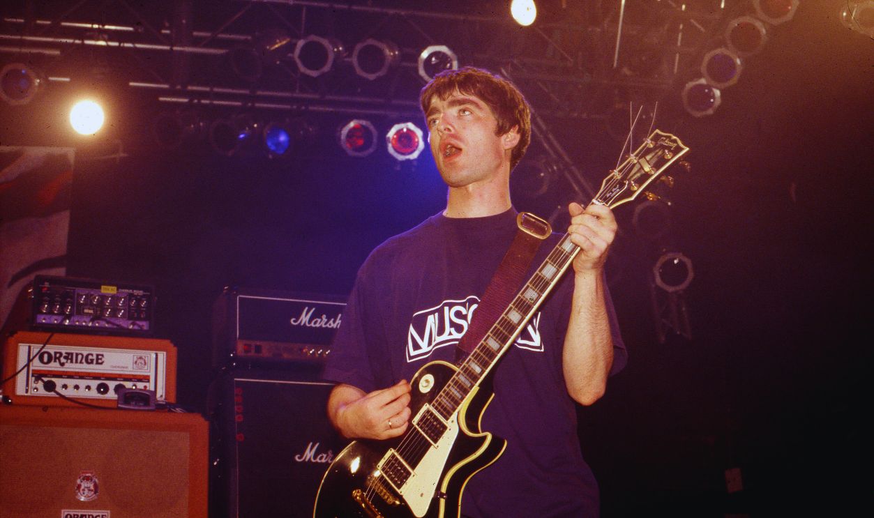 Gettyimages - 501198359, Oasis 1994 Noel Gallagher of Oasis performs on stage, United States, 1994. 