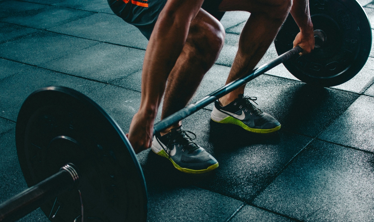 Person About To Lift The Barbell