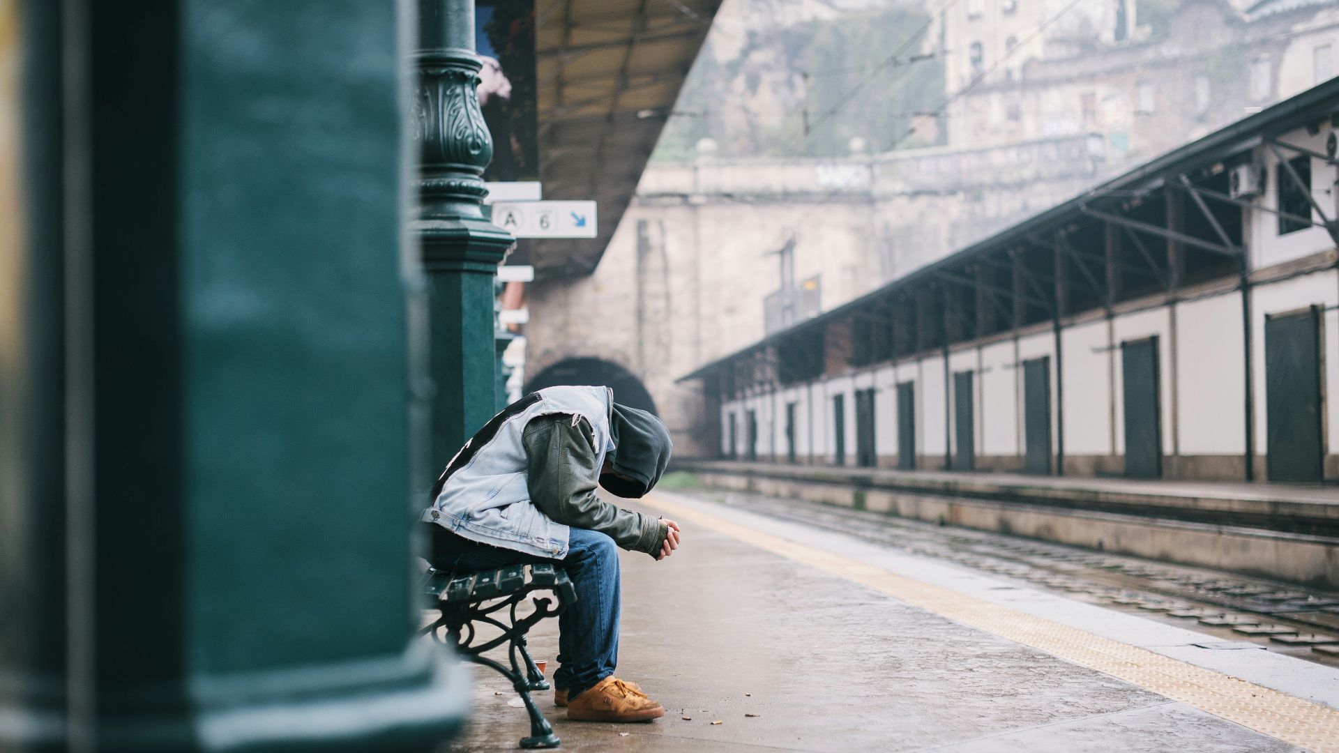 man sitting on bench