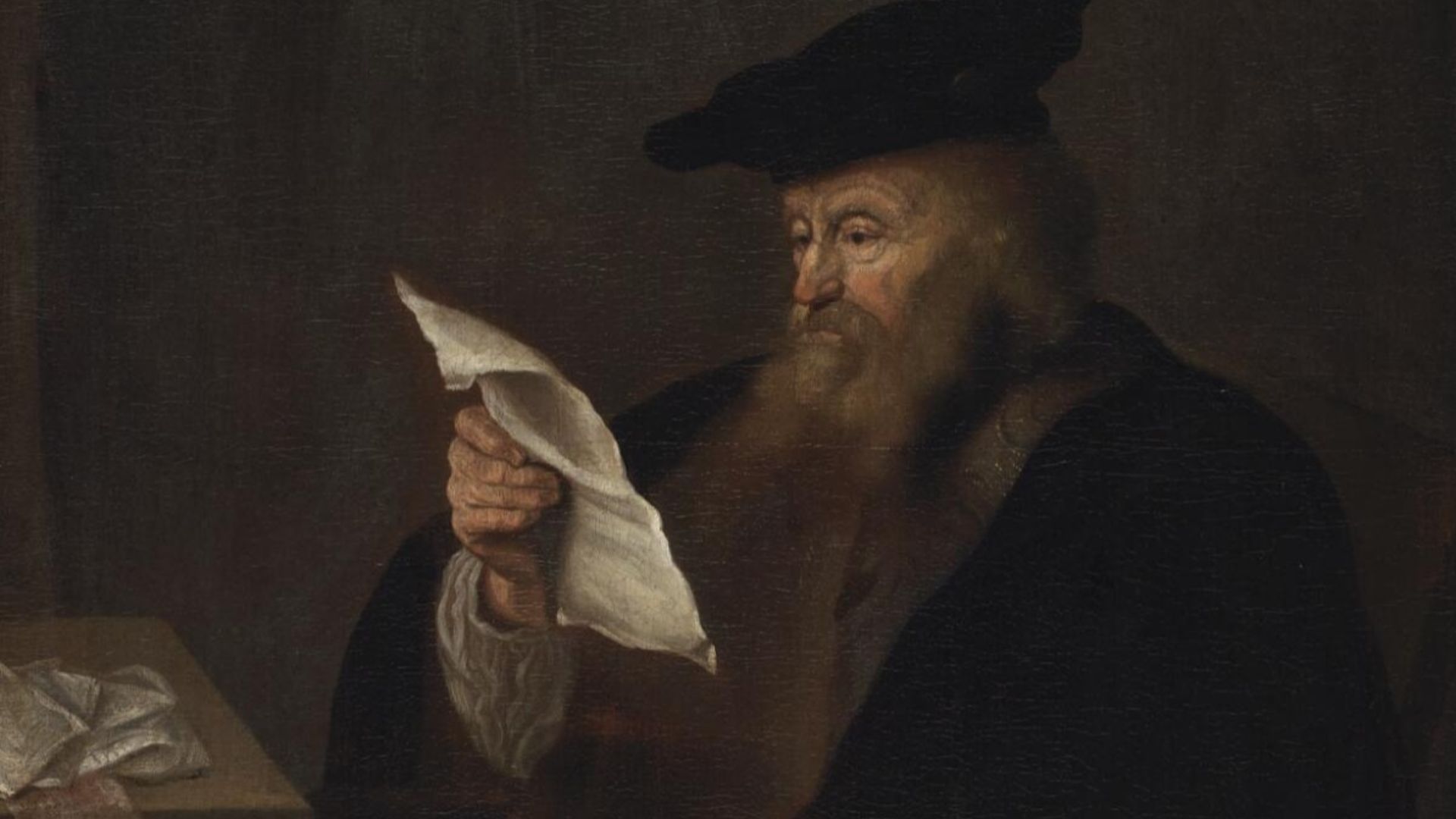 File:Scholar reading in study.jpg