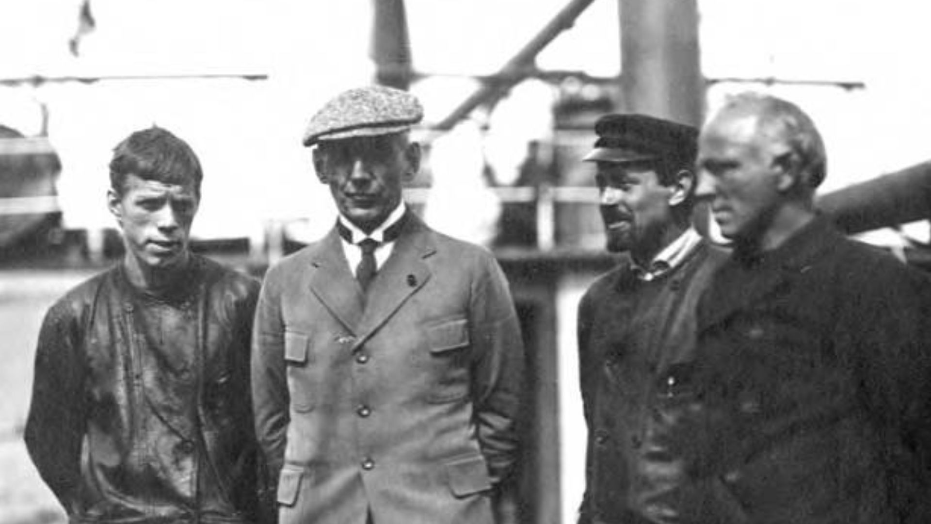 File:Captain Roald Amundsen wearing suit and tie with four men on deck of ship (probably GJOA) off Nome, Alaska, 1906 (AL+CA 6380).jpg