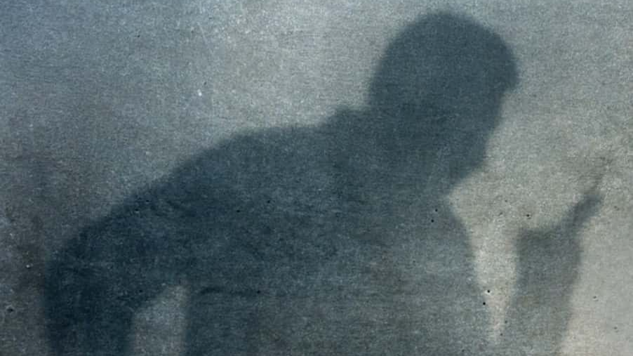 silhouette of man screaming angry