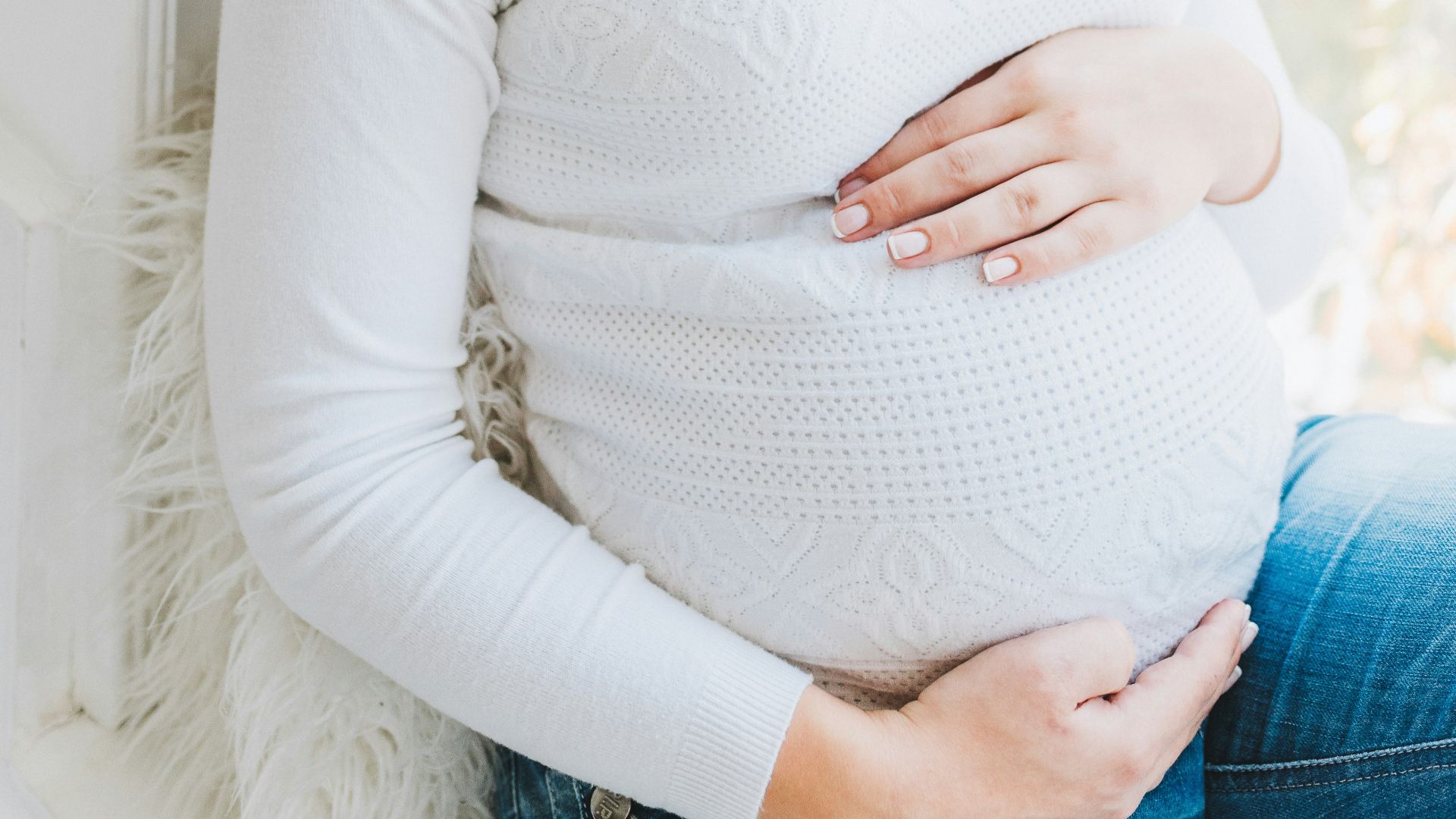 woman in white long sleeve shirt