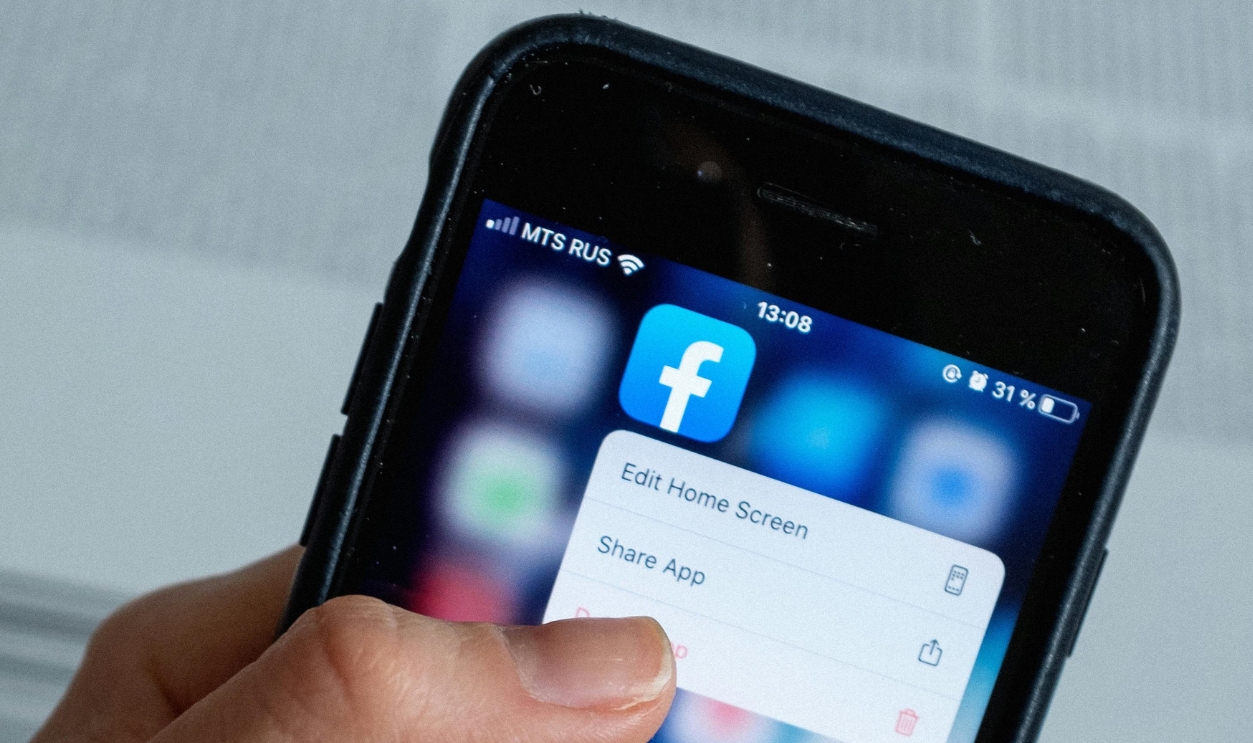 Faceless Person Touching Smartphone Screen