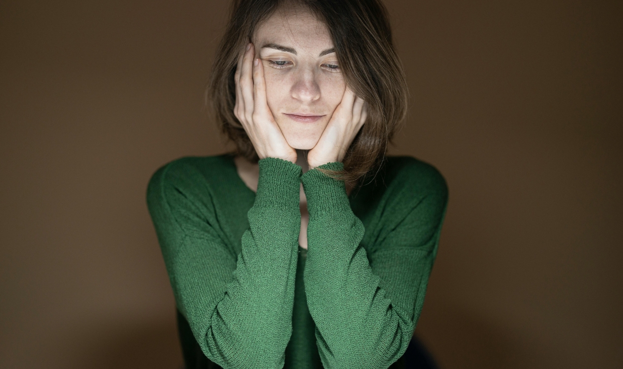 Woman Wearing Green Long Sleeved Shirt