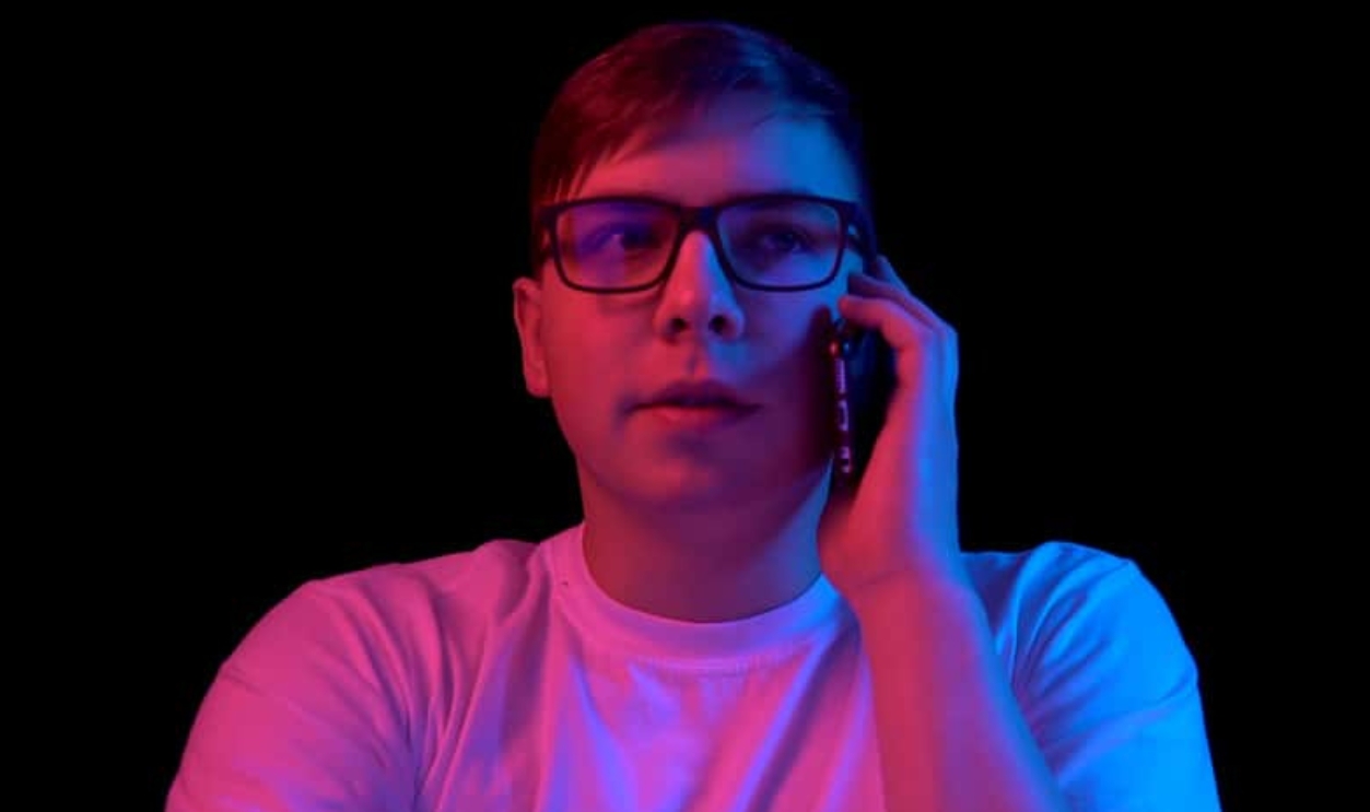 Young Man With A Phone, Shutterstock, 1712729629