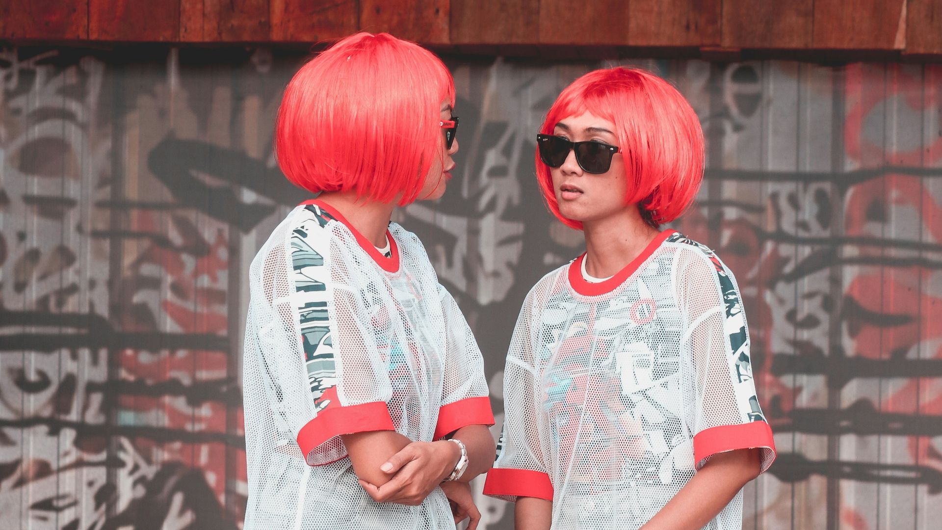 two women talking each other