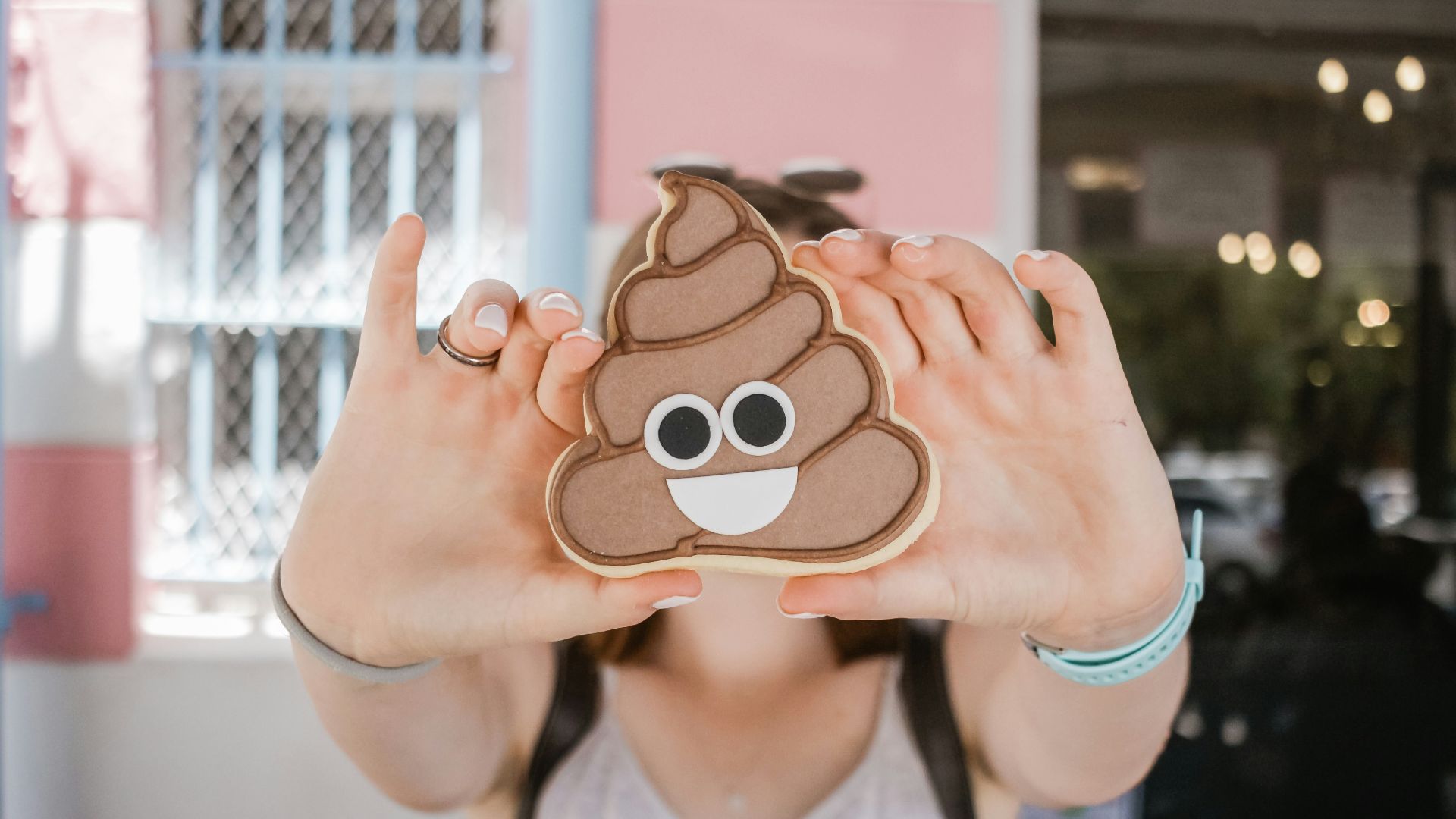 woman holding poop case