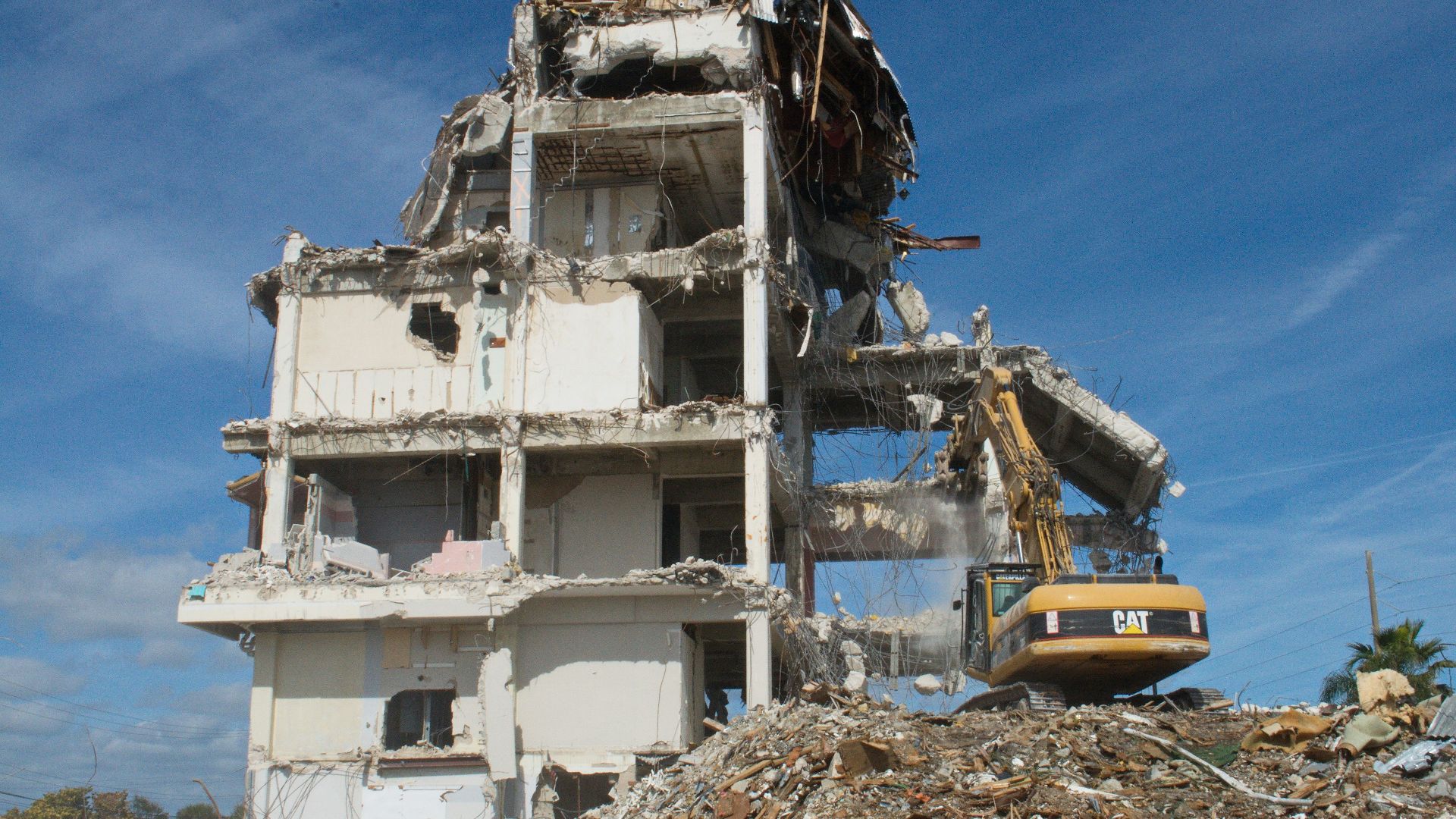 white concrete building under blue sky during daytime