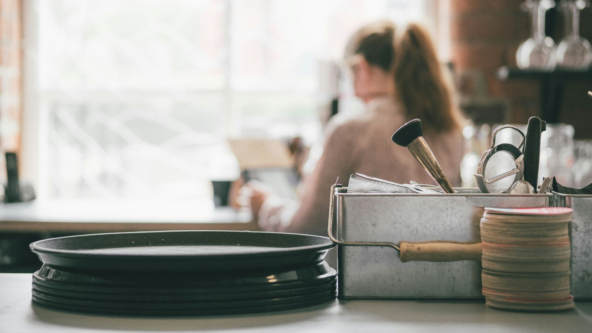 silver round tray on table