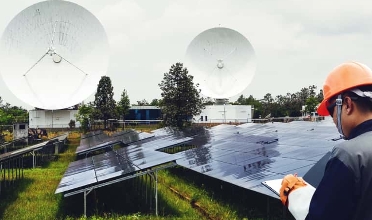 A Man Working ,Satellite Dish  Near Him, Shutterstock, 649300795