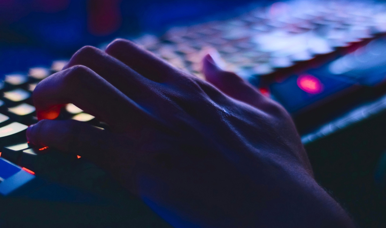 Person Typing On Computer Keyboard