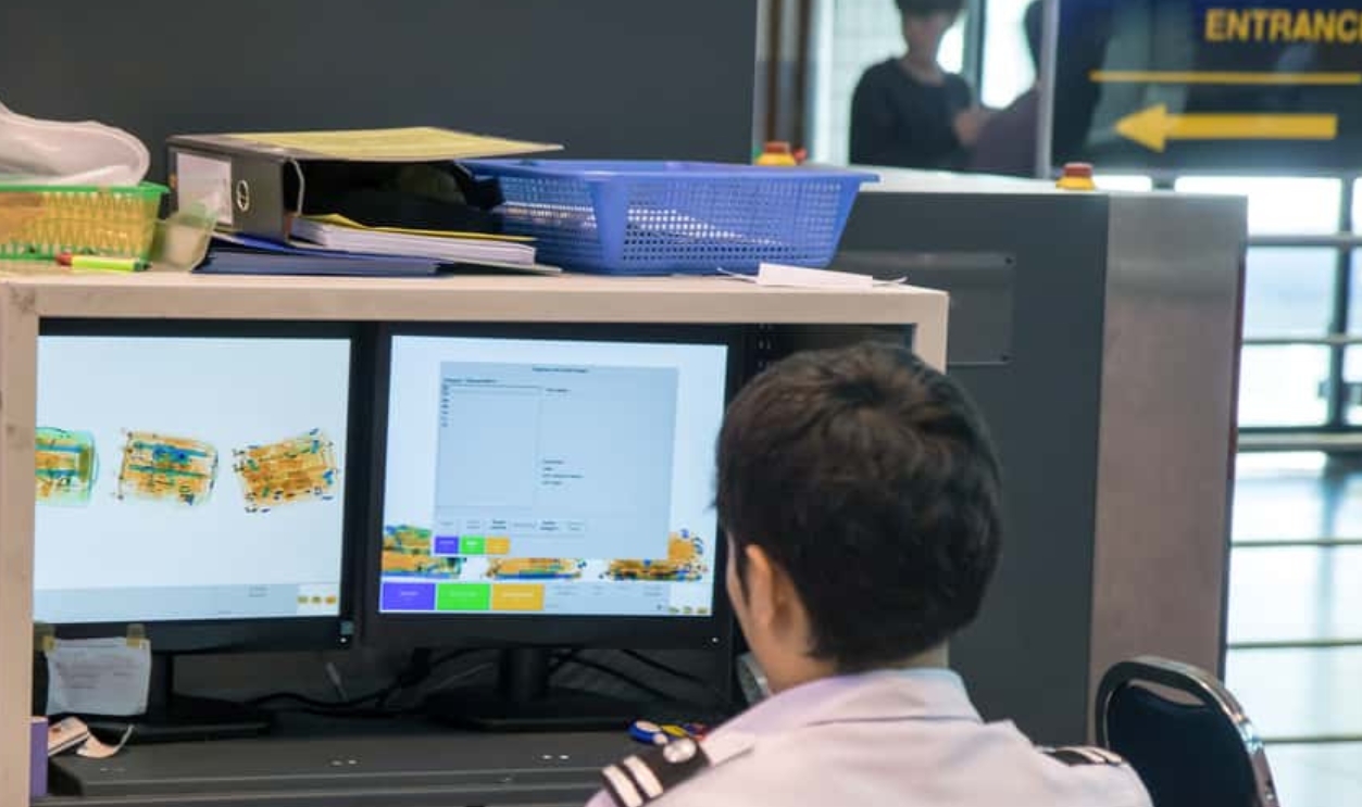 Checking Luggage At The Airport, Shutterstock, 612829535