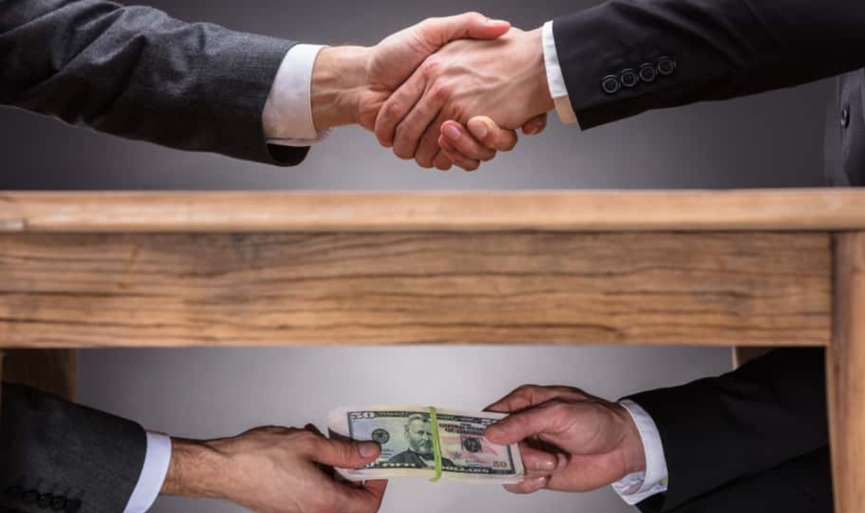 Close-Up Of Two Businesspeople Shaking Hand , Shutterstock, 767182153