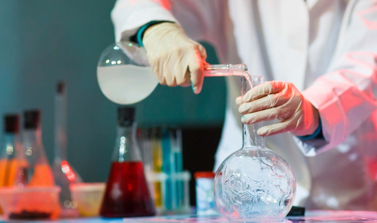 Conducting An Experiment In The Laboratory, Shutterstock, 608537021