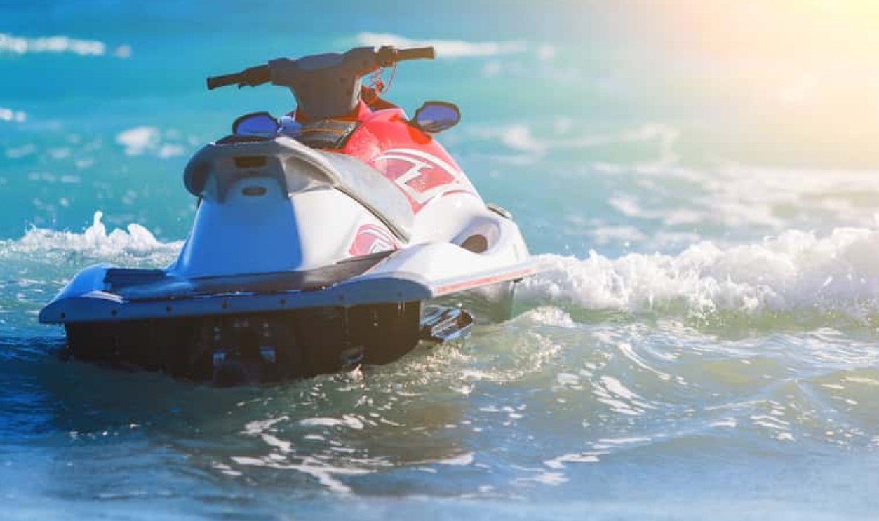 Jet Ski Moored Inon On Waves Of Sea, Shutterstock, 697369594