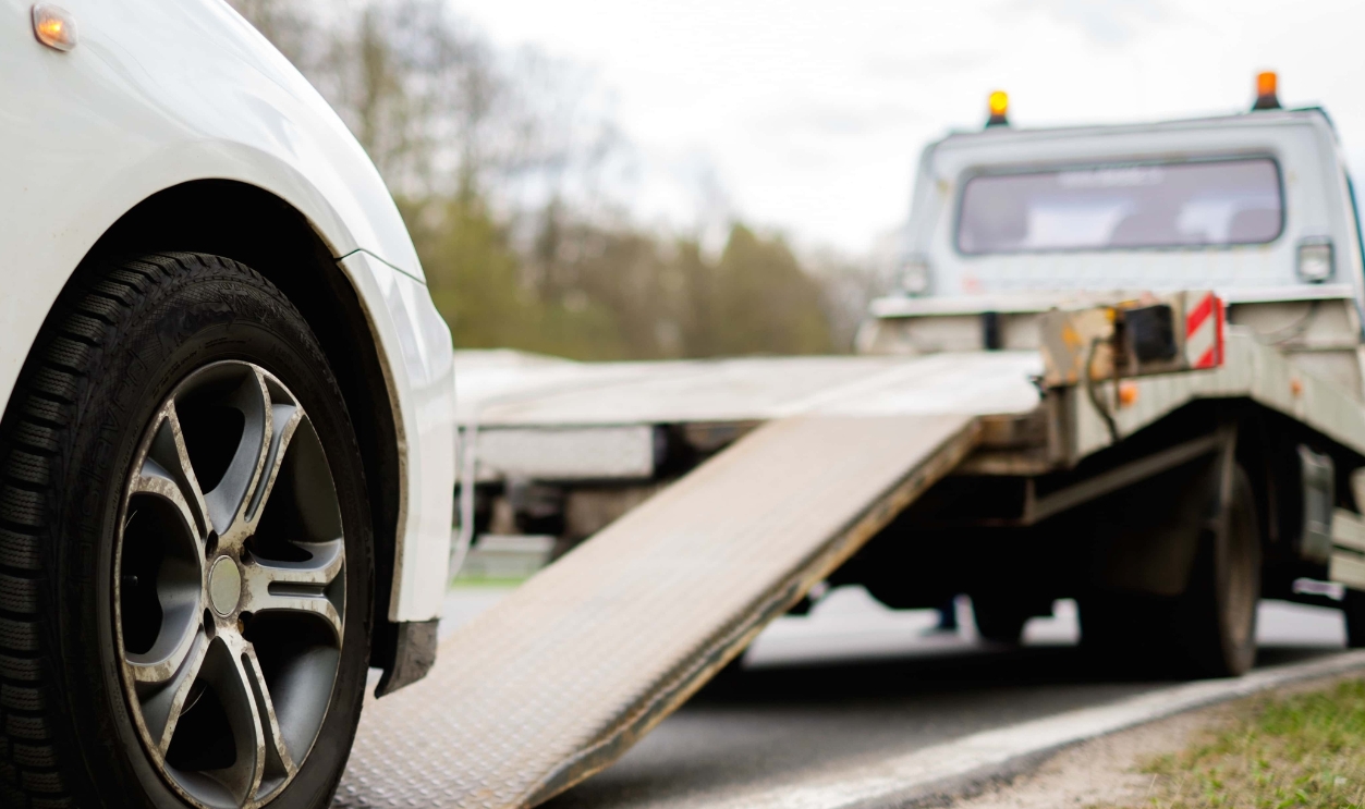 Loading Broken Car On A Tow Truck On A Roadside , Shutterstock, 275048402