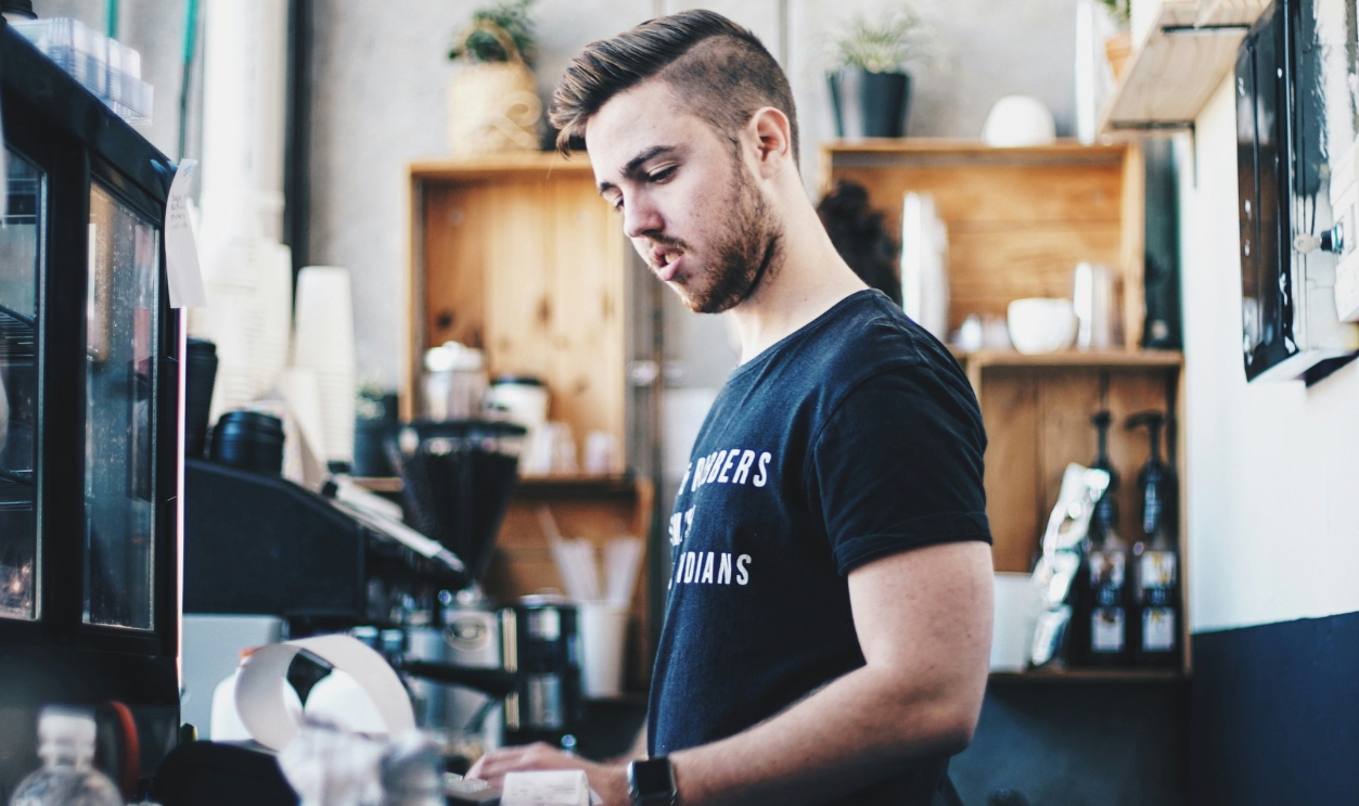 Man Using Cash Register