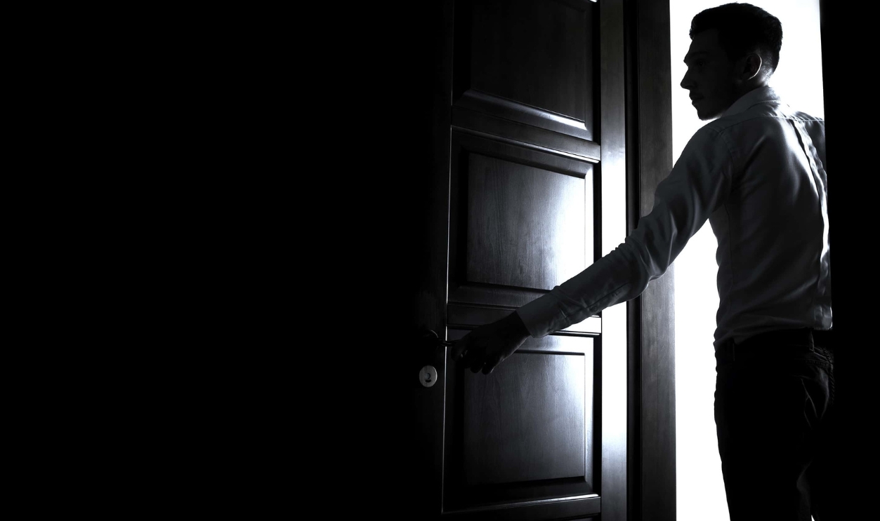 Man Opens The Door To Dark Room, Shutterstock, 68852506