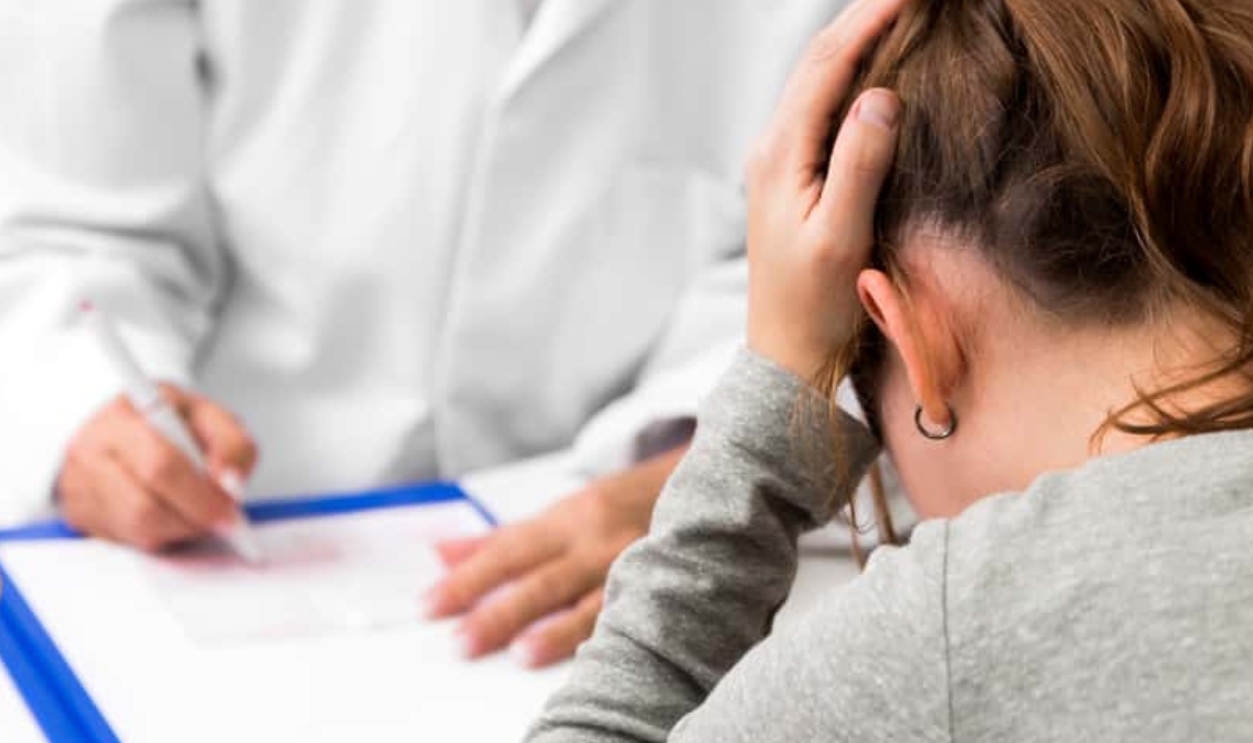 Patient On A Doctor ´S Office, Shutterstock, 1317004700