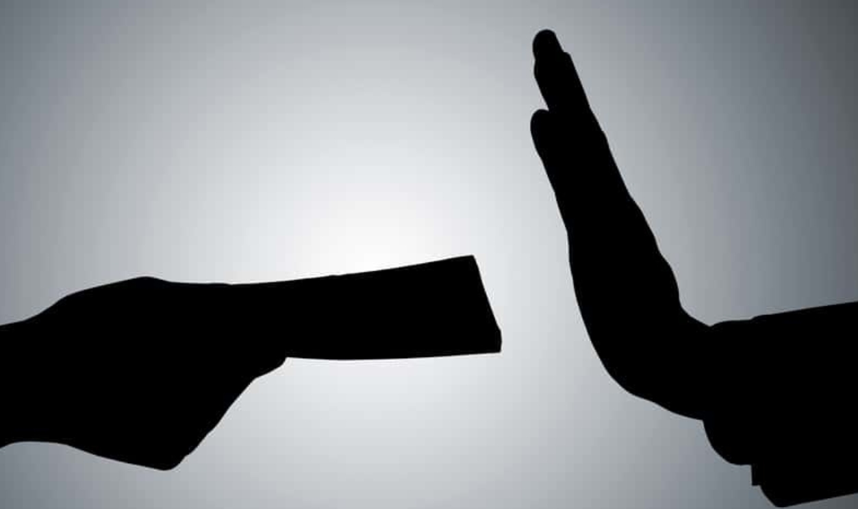 Silhouette Of A Person Refusing To Take Bribe, Shutterstock, 652920394