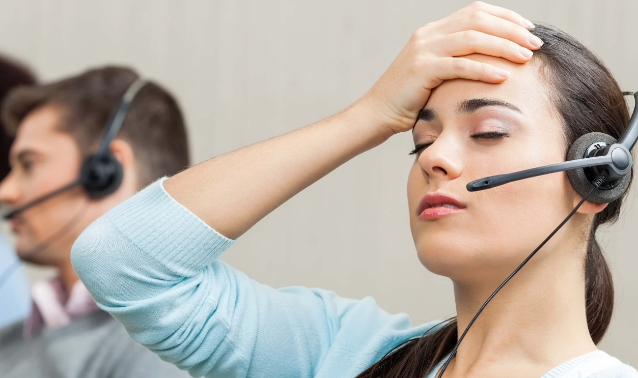 Tired Female Customer Service Agent, Shutterstock, 269493536