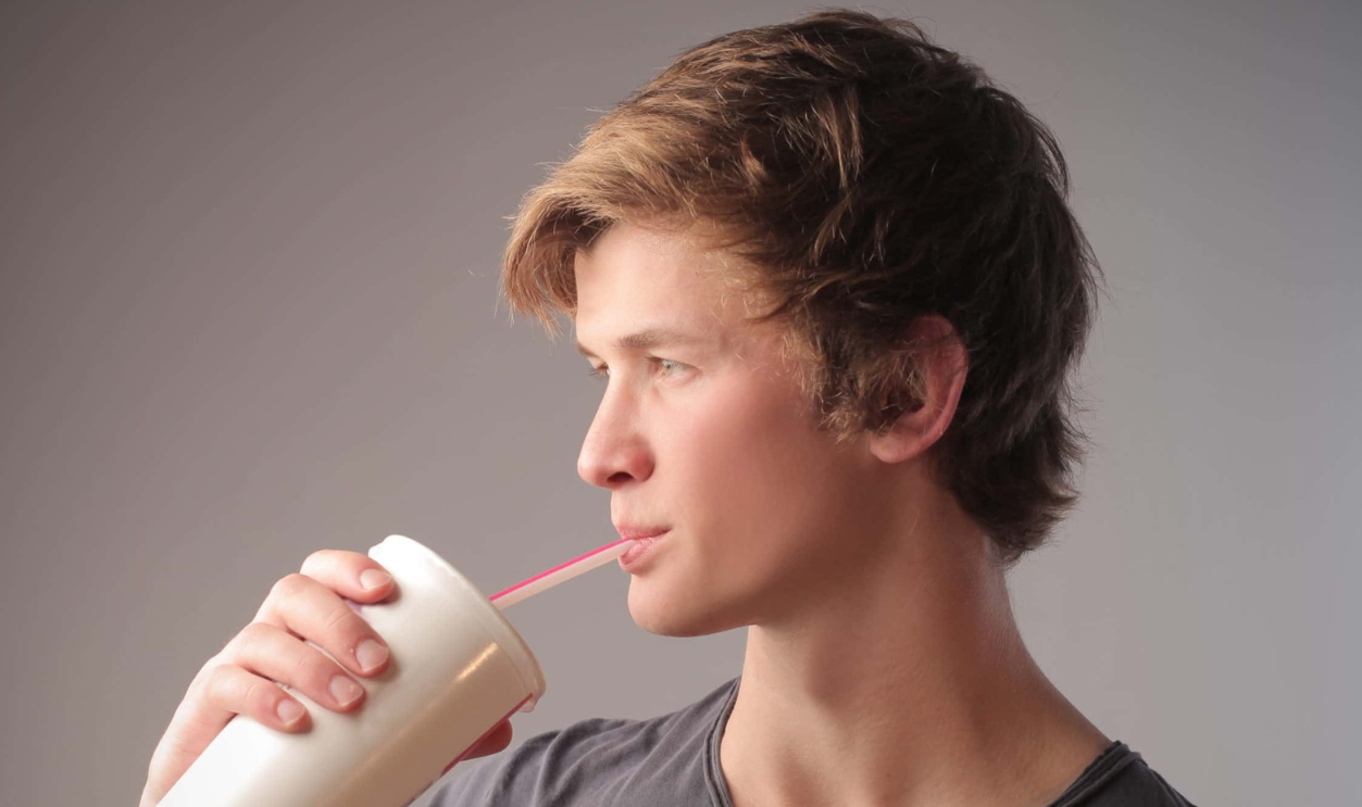 Young Man Drinking, Shutterstock, 90720694