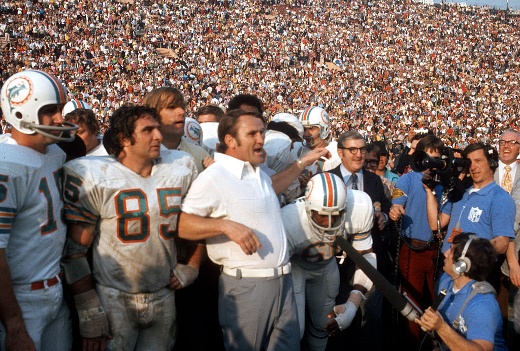 Head Coach Don Shula and Nick Bouniconti #85 of the Miami Dolphins celebrates defeating the Washington Redskins