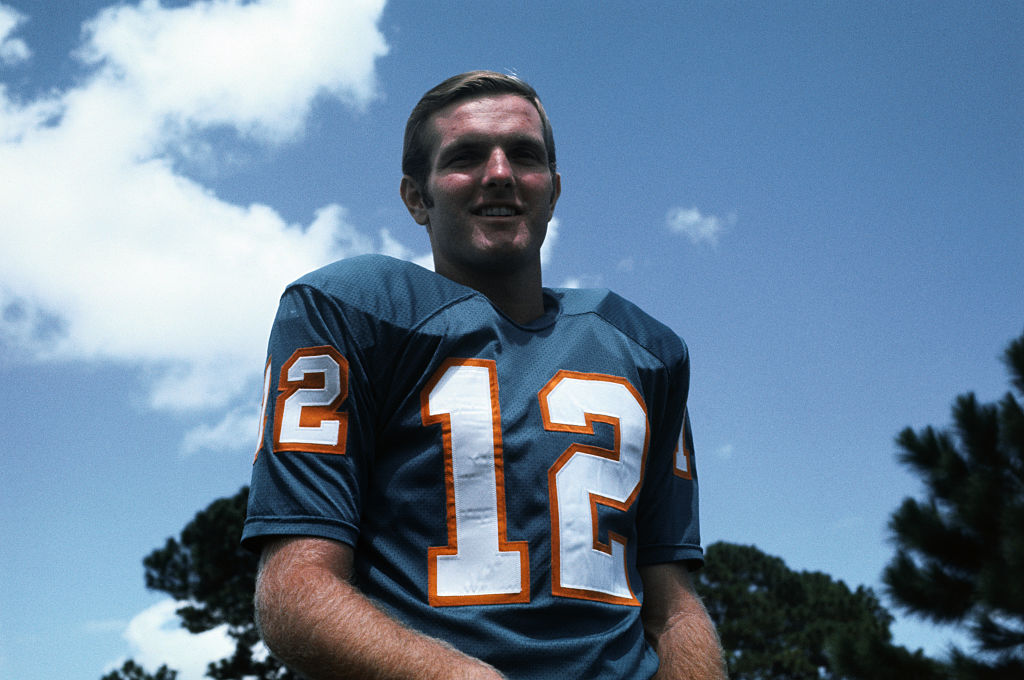 Close up of Miami Dolphins football team's Bob Gries, smiling in uniform
