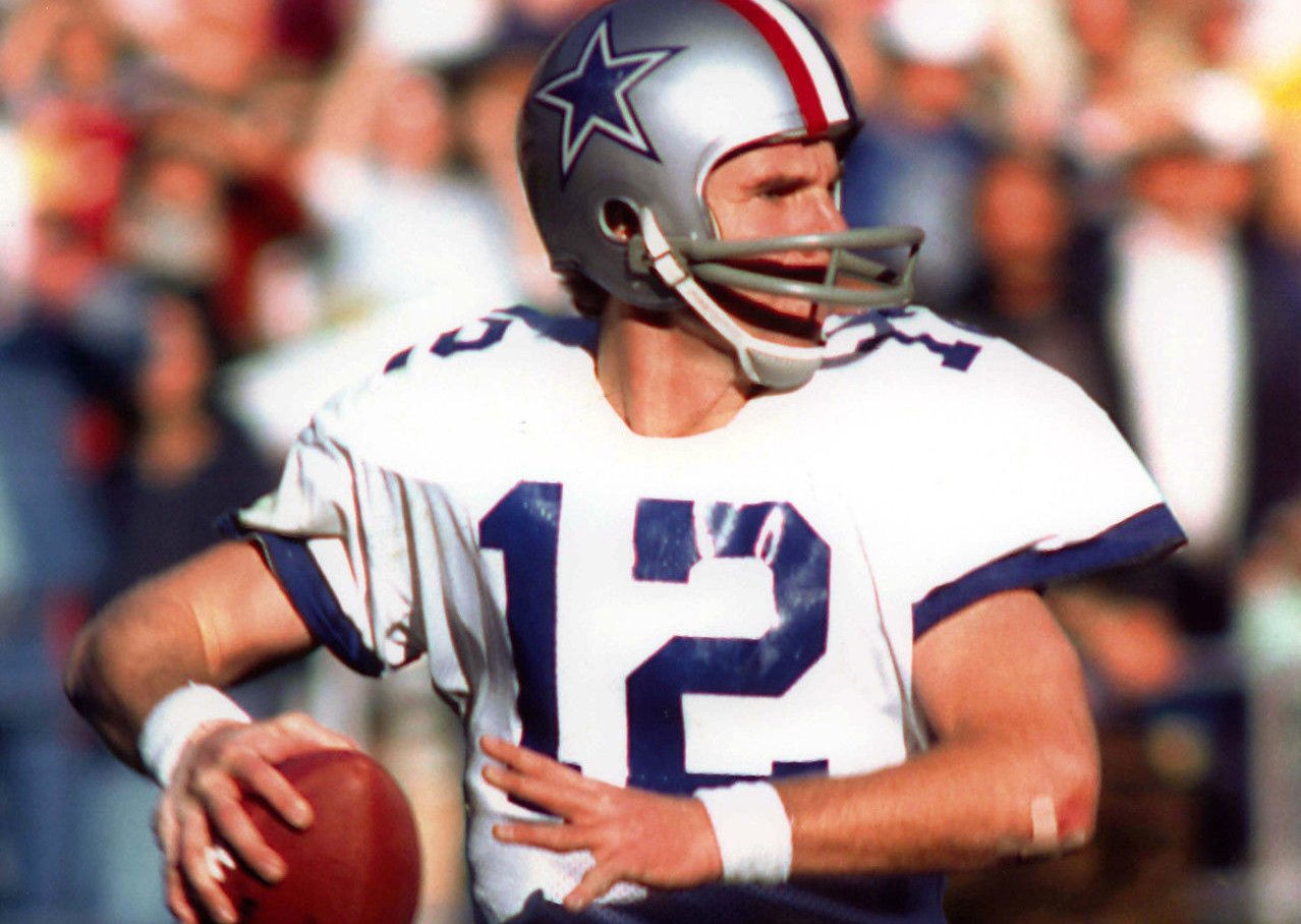 Roger Staubach, quarterback with the Dallas Cowboys, drops back to pass