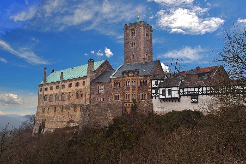 A large castle sitting on top of a hill Castle Wartburg castle