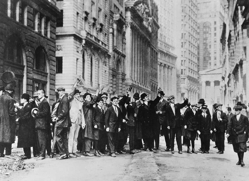 People gather on Wall Street