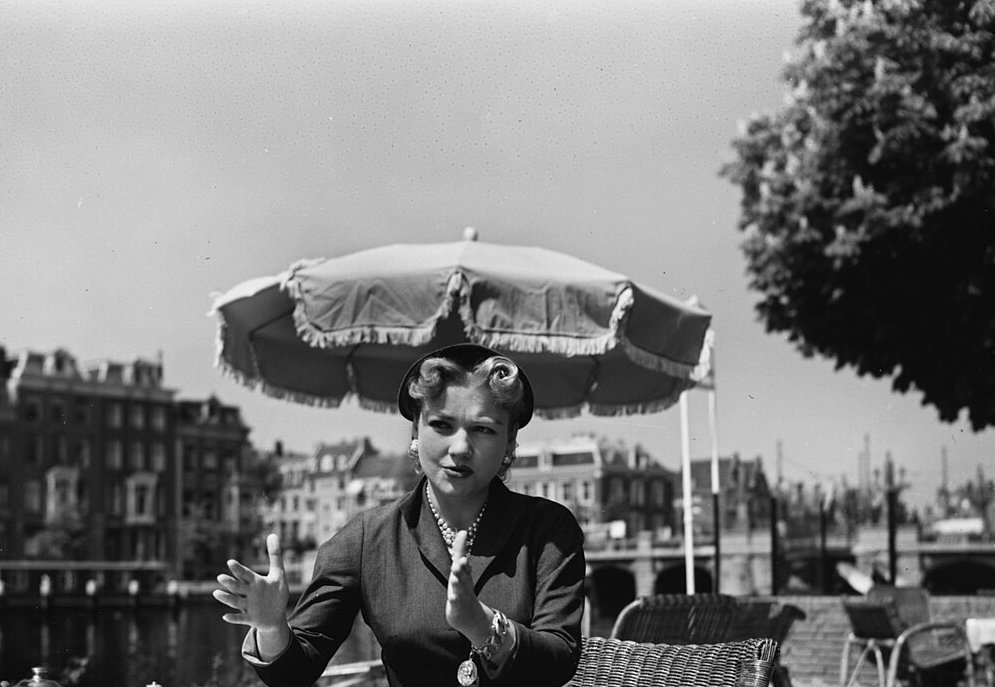 Anne Baxter on the terrace of the Amstel Hotel