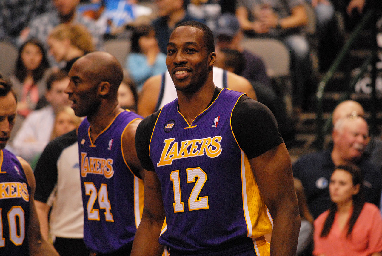 Dwight Howard of the LA Lakers, with Kobe Bryant and Steve Nash in the background