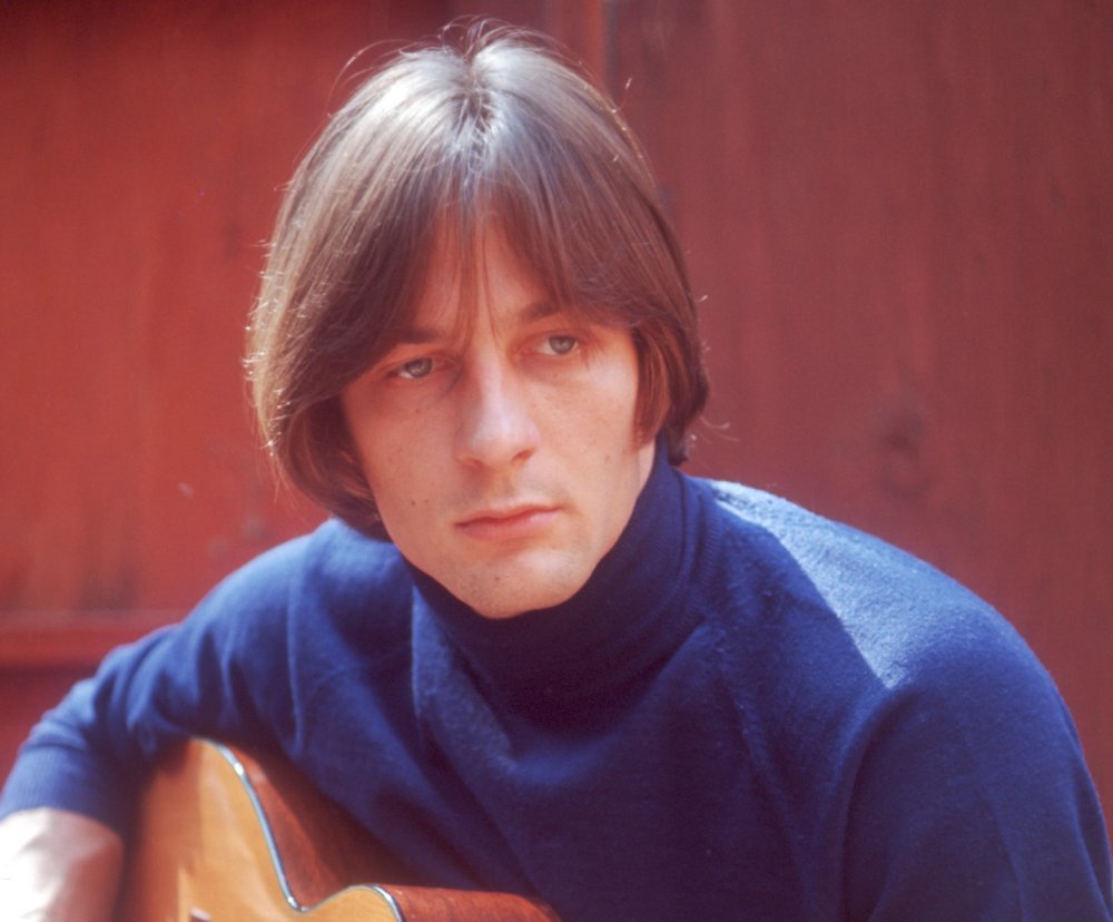 Portrait Photo of Gene Clark in blue outfit looking to the right