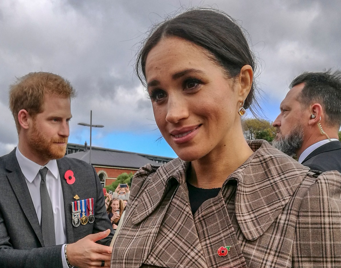 The Duke and Duchess of Sussex chat with members of the crowd