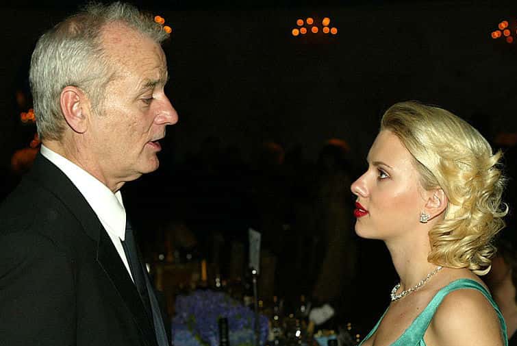 Actors Bill Murray (L) and Scarlett Johansson talk at the 76th Annual Academy Awards Governors Ball