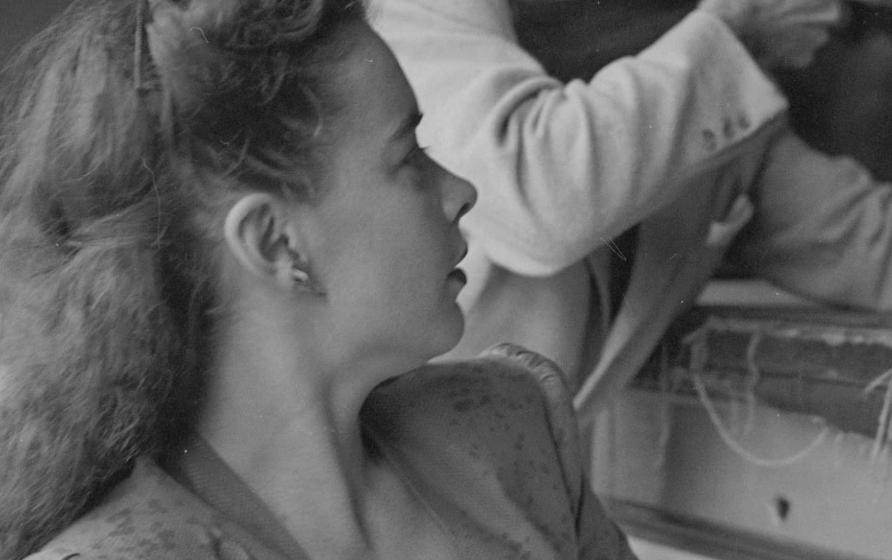 Susan Peters Holding a Rifle