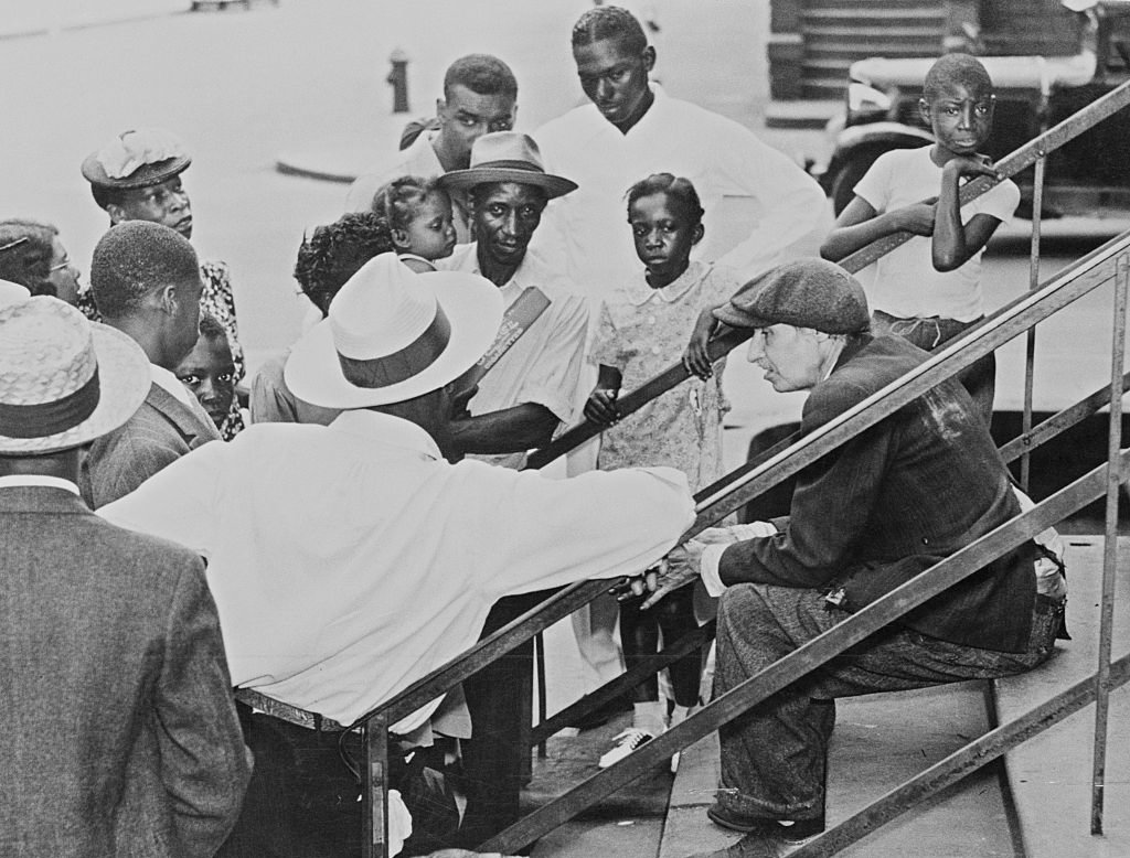 Langley Collyer Chatting with Neighbors Outside