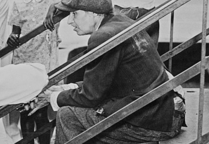 Langley Collyer wearing ripped clothes